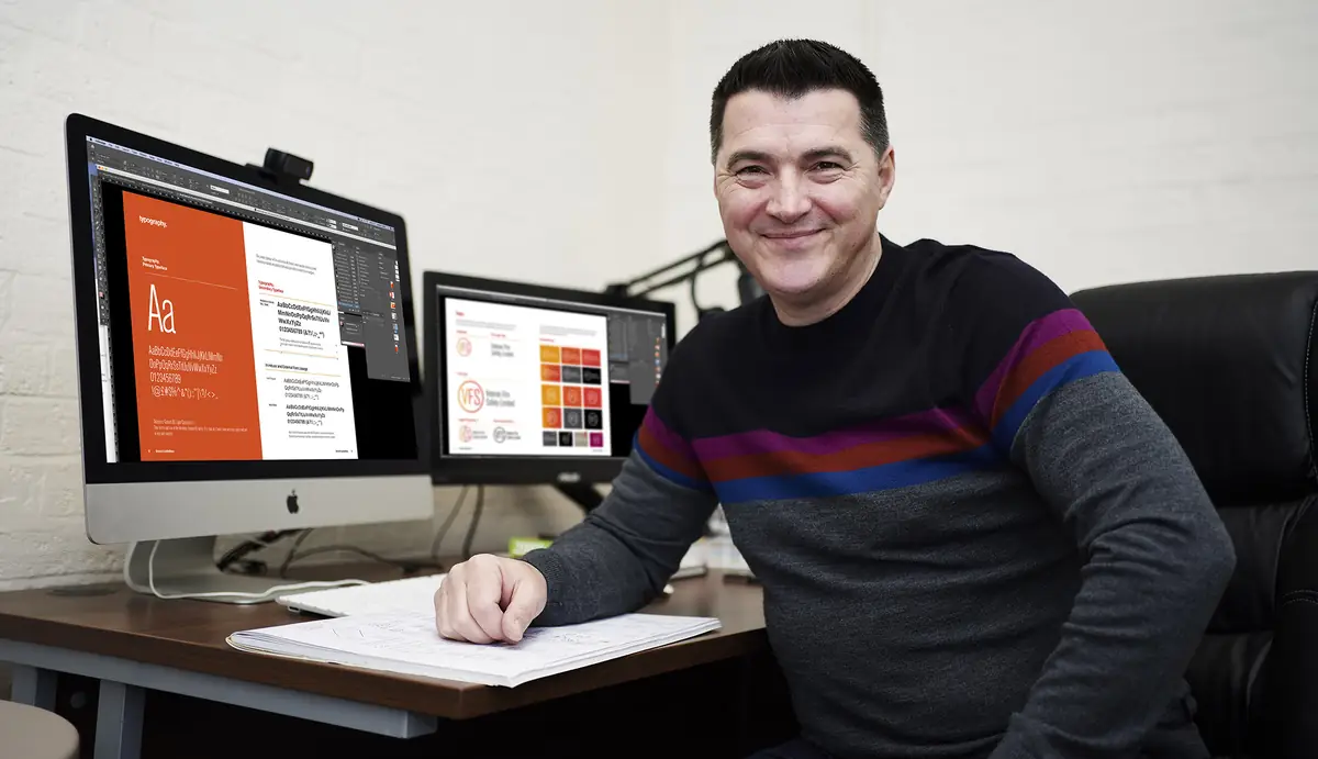 Steve Walker at his desk in Leicester